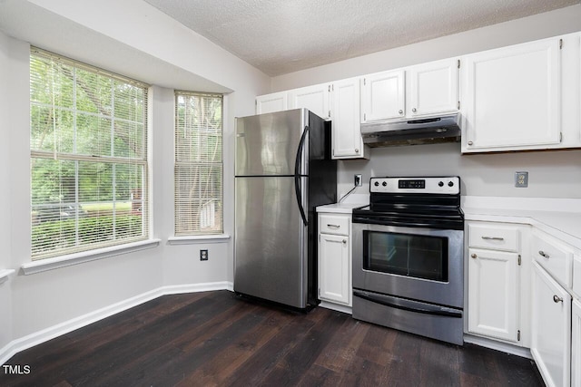 105 Sir Richard Ln, Chapel Hill, NC 27517 - kitchen with appliances with stainless steel finishes, under cabinet range hood, light countertops, dark wood-type flooring, and white cabinetry