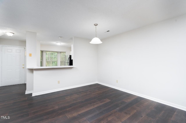 105 Sir Richard Ln, Chapel Hill, NC 27517 - unfurnished room with baseboards and dark wood-type flooring