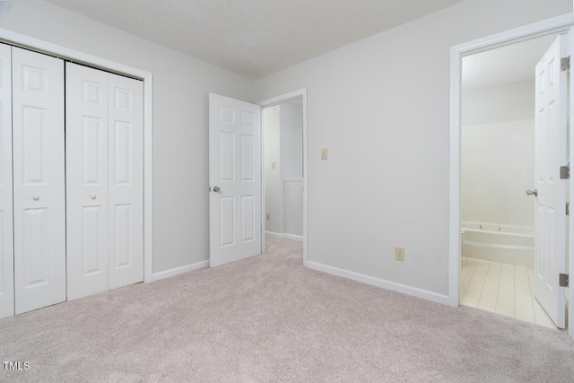 105 Sir Richard Ln, Chapel Hill, NC 27517 - unfurnished bedroom with carpet floors, a closet, baseboards, and ensuite bathroom