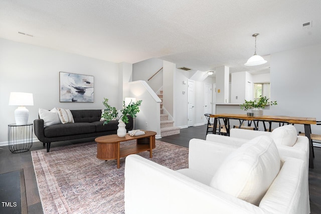 105 Sir Richard Ln, Chapel Hill, NC 27517 - living room featuring dark wood-style floors and stairway