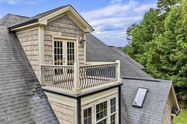 4720 Yates Mill Pond Rd, Raleigh, NC 27606 - view of property exterior with a balcony, roof with shingles, and french doors
