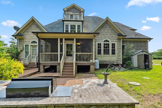 4720 Yates Mill Pond Rd, Raleigh, NC 27606 - view of front of home with a sunroom, a front lawn, roof with shingles, and a patio area