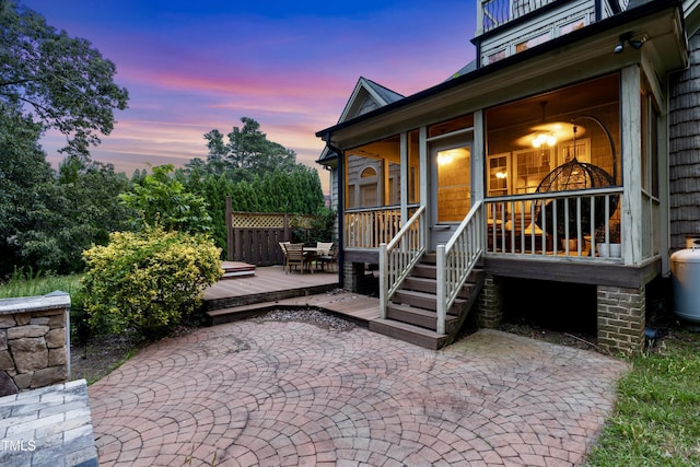 4720 Yates Mill Pond Rd, Raleigh, NC 27606 - exterior entry at dusk with a deck
