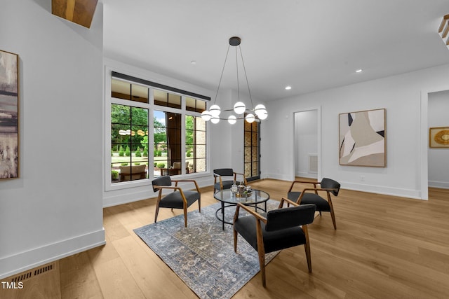 15517 Possum Track Rd, Raleigh, NC 27614 - living area featuring light wood-style flooring, baseboards, recessed lighting, and a chandelier