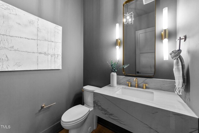 15517 Possum Track Rd, Raleigh, NC 27614 - bathroom with toilet and vanity