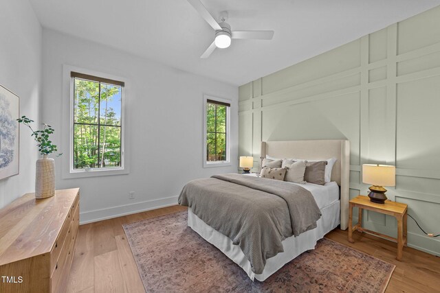 15517 Possum Track Rd, Raleigh, NC 27614 - bedroom featuring light wood finished floors, baseboards, and a ceiling fan