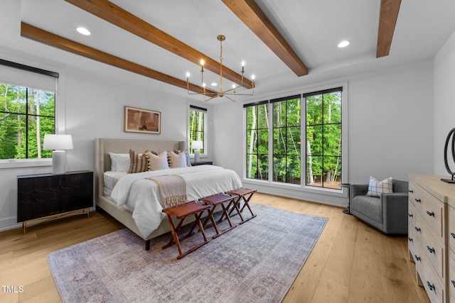 15517 Possum Track Rd, Raleigh, NC 27614 - bedroom featuring beam ceiling, light wood-style floors, a chandelier, and recessed lighting
