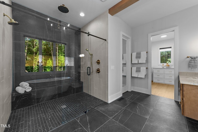 15517 Possum Track Rd, Raleigh, NC 27614 - full bathroom featuring vanity, a stall shower, a garden tub, recessed lighting, and baseboards