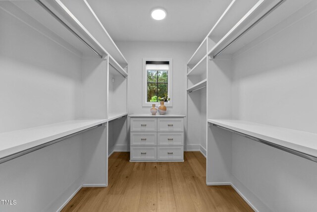 15517 Possum Track Rd, Raleigh, NC 27614 - walk in closet with light wood-style floors