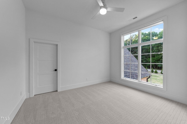 15517 Possum Track Rd, Raleigh, NC 27614 - spare room featuring carpet floors, a ceiling fan, and baseboards