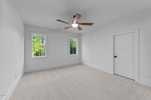 15517 Possum Track Rd, Raleigh, NC 27614 - unfurnished room featuring a ceiling fan, baseboards, and carpet