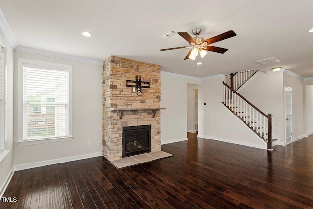 125 Durban Meadow Dr, Holly Springs, NC 27540 - unfurnished living room with ornamental molding, ceiling fan, stairs, hardwood / wood-style floors, and baseboards