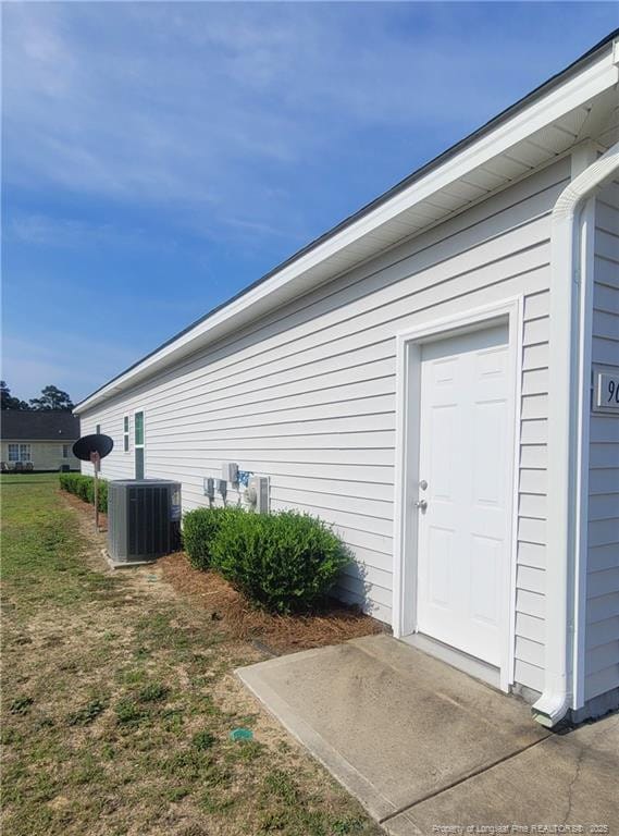 90 Tyson Carriage Ln, Autryville, NC 28318 - doorway to property with cooling unit