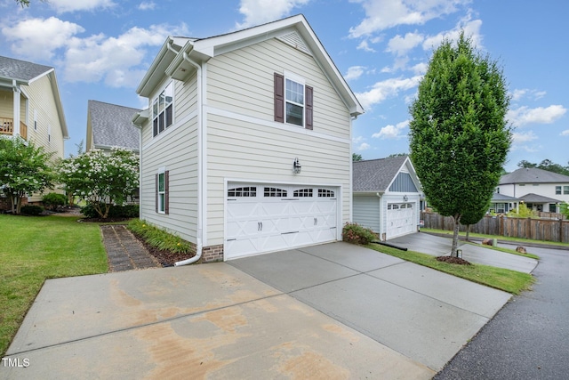 43 Salt Cedar Ln, Chapel Hill, NC 27516 - view of side of property with a garage and driveway