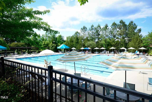 43 Salt Cedar Ln, Chapel Hill, NC 27516 - community pool featuring view of scattered trees and a patio