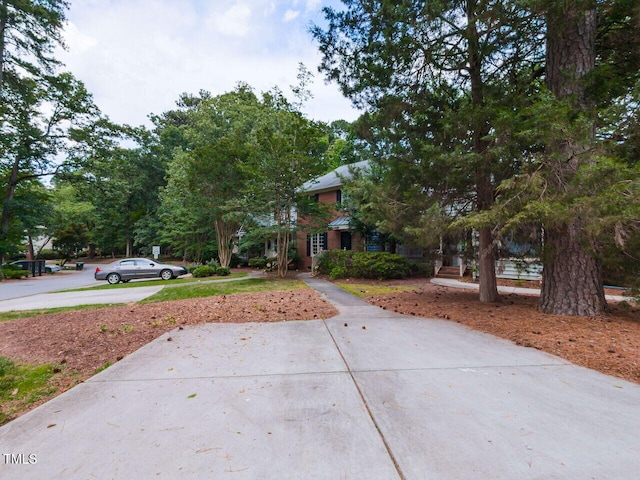 102 Sanair Ct, Apex, NC 27502 - view of property hidden behind natural elements