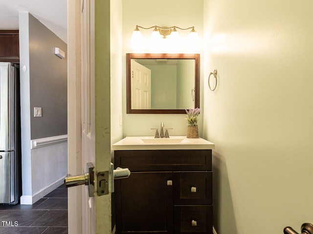 102 Sanair Ct, Apex, NC 27502 - bathroom with vanity, tile patterned floors, and baseboards