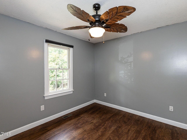 102 Sanair Ct, Apex, NC 27502 - empty room with baseboards, dark wood-type flooring, and ceiling fan