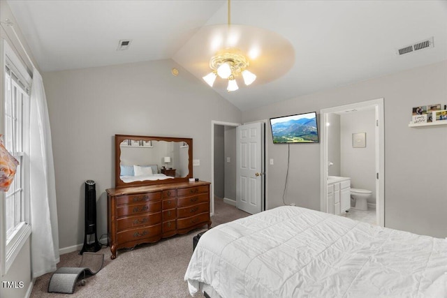 2750 Michelle Ct, Creedmoor, NC 27522 - carpeted bedroom with lofted ceiling and connected bathroom