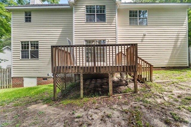 2750 Michelle Ct, Creedmoor, NC 27522 - rear view of house featuring crawl space, a deck, a chimney, and stairway