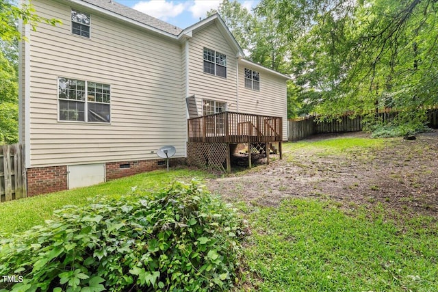 2750 Michelle Ct, Creedmoor, NC 27522 - rear view of property with crawl space, a wooden deck, and a fenced backyard