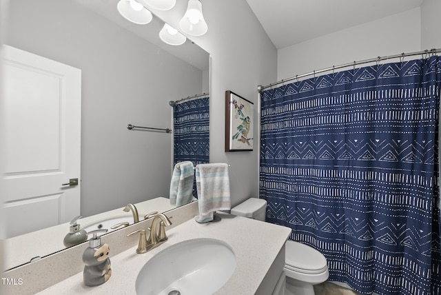 6313 Kayton St, Raleigh, NC 27616 - bathroom with toilet, vanity, and a shower with shower curtain