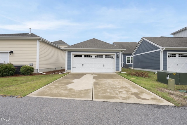 6313 Kayton St, Raleigh, NC 27616 - view of front of home with a front lawn and a garage