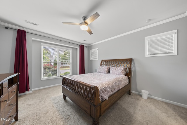 6313 Kayton St, Raleigh, NC 27616 - bedroom featuring ornamental molding, baseboards, light carpet, and ceiling fan