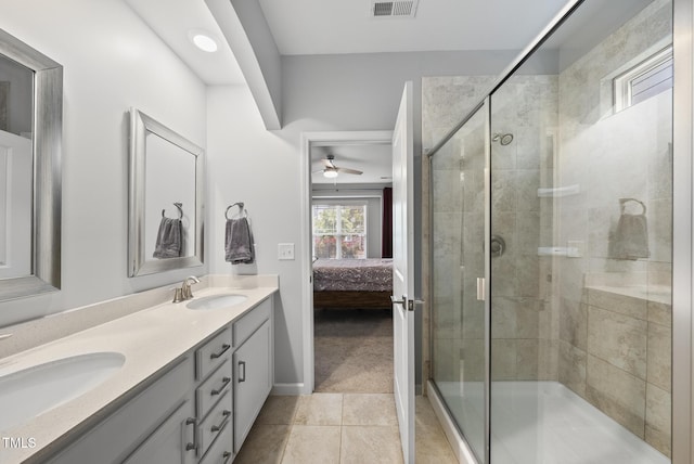 6313 Kayton St, Raleigh, NC 27616 - full bath with plenty of natural light, connected bathroom, double vanity, and tile patterned floors
