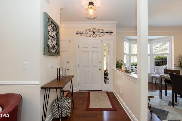 11217 Maplecroft Ct, Raleigh, NC 27617 - foyer with ornamental molding, wood finished floors, and baseboards