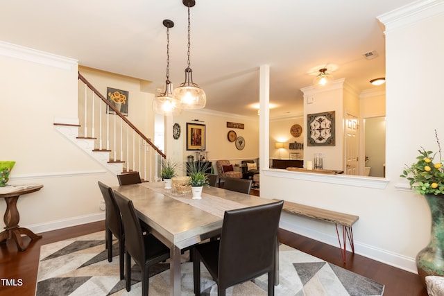 11217 Maplecroft Ct, Raleigh, NC 27617 - dining space featuring stairway, wood finished floors, ornamental molding, and baseboards