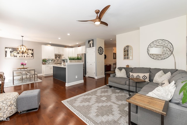 11217 Maplecroft Ct, Raleigh, NC 27617 - living room featuring a chandelier, dark wood-style floors, a ceiling fan, and recessed lighting