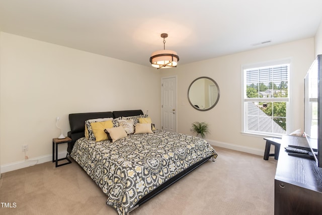 11217 Maplecroft Ct, Raleigh, NC 27617 - bedroom featuring light colored carpet and baseboards