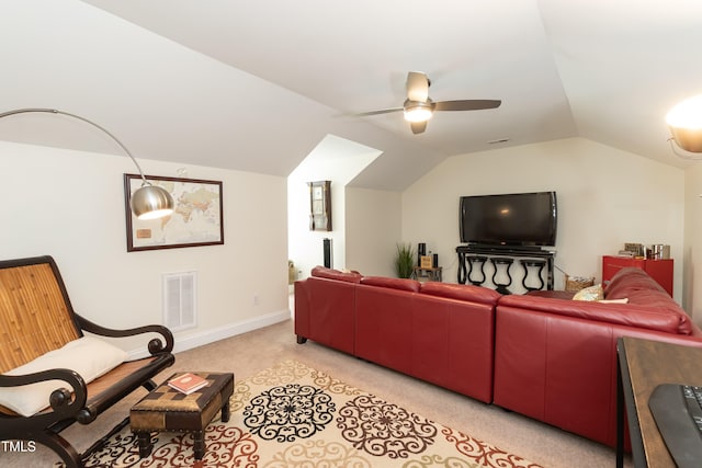 11217 Maplecroft Ct, Raleigh, NC 27617 - living room with a ceiling fan, light carpet, vaulted ceiling, and baseboards