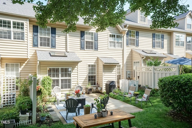 11217 Maplecroft Ct, Raleigh, NC 27617 - back of house featuring a patio area and roof with shingles