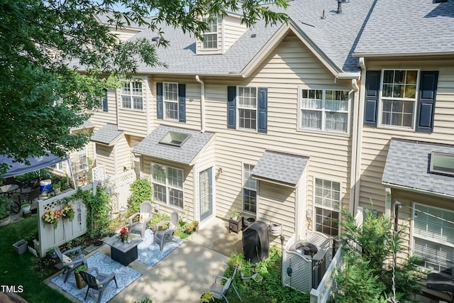11217 Maplecroft Ct, Raleigh, NC 27617 - rear view of house featuring a patio area and roof with shingles