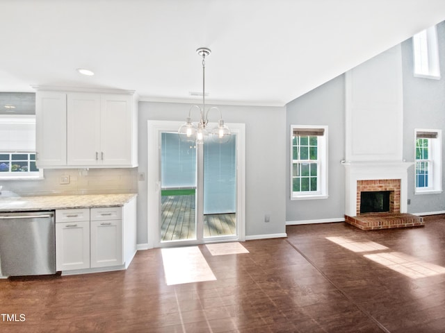 117 Brierridge Dr, Apex, NC 27502 - kitchen featuring stainless steel dishwasher, healthy amount of natural light, white cabinets, backsplash, and recessed lighting