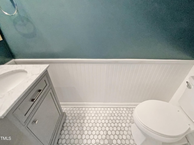 117 Brierridge Dr, Apex, NC 27502 - half bath with a wainscoted wall, vanity, and toilet