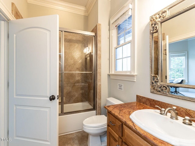 5768 Cavanaugh Dr, Raleigh, NC 27614 - bathroom with ornamental molding, vanity, healthy amount of natural light, and combined bath / shower with glass door