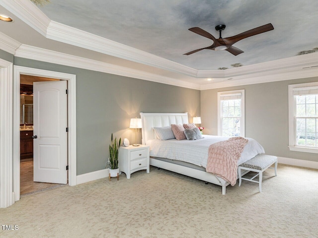 5768 Cavanaugh Dr, Raleigh, NC 27614 - bedroom featuring multiple windows, a tray ceiling, carpet floors, ornamental molding, and a ceiling fan