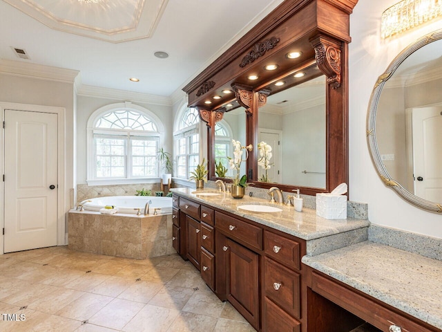 5768 Cavanaugh Dr, Raleigh, NC 27614 - bathroom with double vanity, a garden tub, crown molding, recessed lighting, and tile patterned flooring