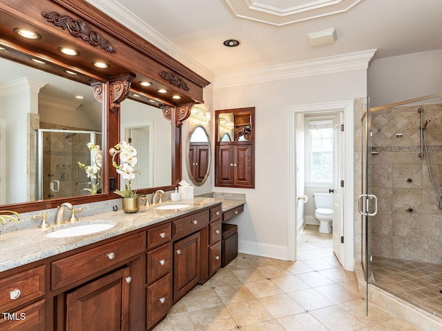 5768 Cavanaugh Dr, Raleigh, NC 27614 - bathroom featuring double vanity, a stall shower, ornamental molding, tile patterned flooring, and recessed lighting