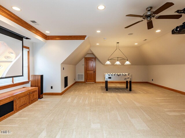5768 Cavanaugh Dr, Raleigh, NC 27614 - recreation room with light carpet, ceiling fan, recessed lighting, and vaulted ceiling