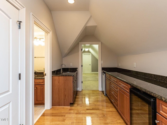 5768 Cavanaugh Dr, Raleigh, NC 27614 - bar area featuring wine cooler, light wood-type flooring, recessed lighting, and vaulted ceiling