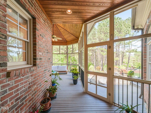 5768 Cavanaugh Dr, Raleigh, NC 27614 - sunroom featuring a ceiling fan, lofted ceiling, and healthy amount of natural light