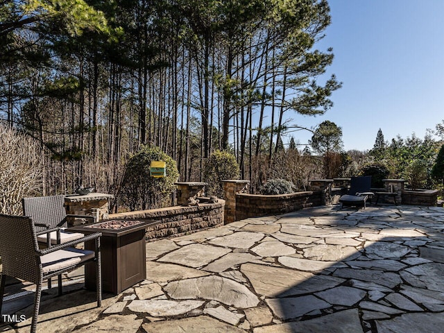 5768 Cavanaugh Dr, Raleigh, NC 27614 - view of patio with an outdoor fire pit