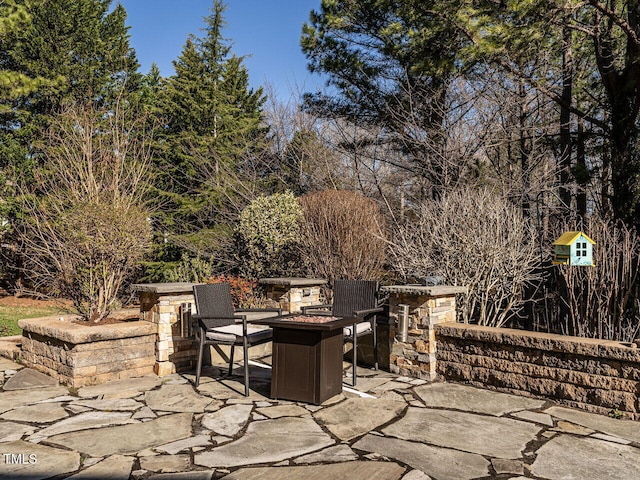 5768 Cavanaugh Dr, Raleigh, NC 27614 - view of patio / terrace with a fire pit