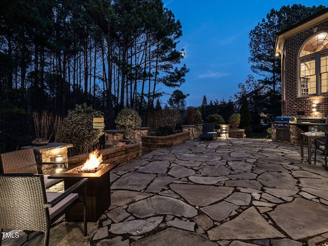 5768 Cavanaugh Dr, Raleigh, NC 27614 - view of patio with a fire pit and outdoor dining area