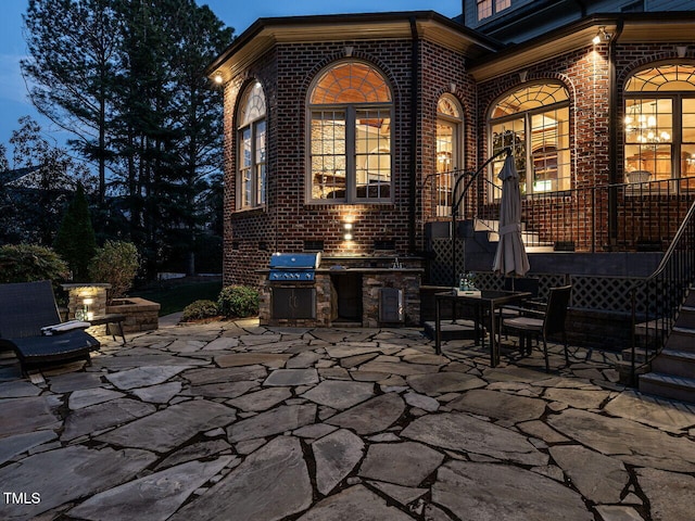 5768 Cavanaugh Dr, Raleigh, NC 27614 - view of patio / terrace with outdoor dining space and exterior kitchen