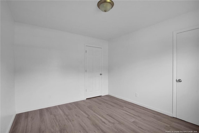 4709 Alamance Rd, Fayetteville, NC 28304 - spare room with wood finished floors and baseboards